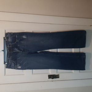 575 distressed jeans